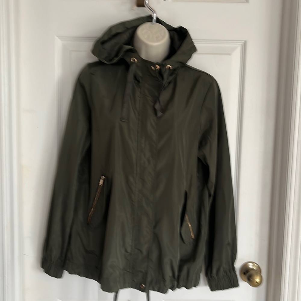 Rain/ windbreaker Jacket with hood .